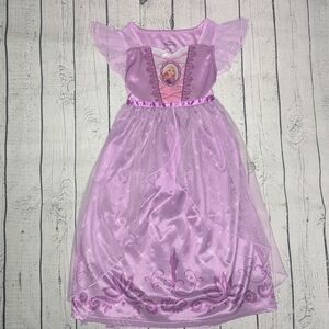 Girls Purple Princess Dress with Character Medallion